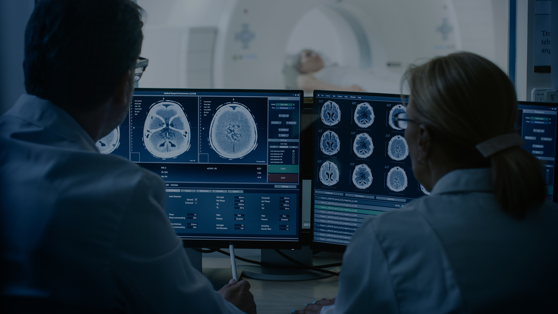 In Control Room Doctor and Radiologist Discuss Diagnosis while W CT scan imaging